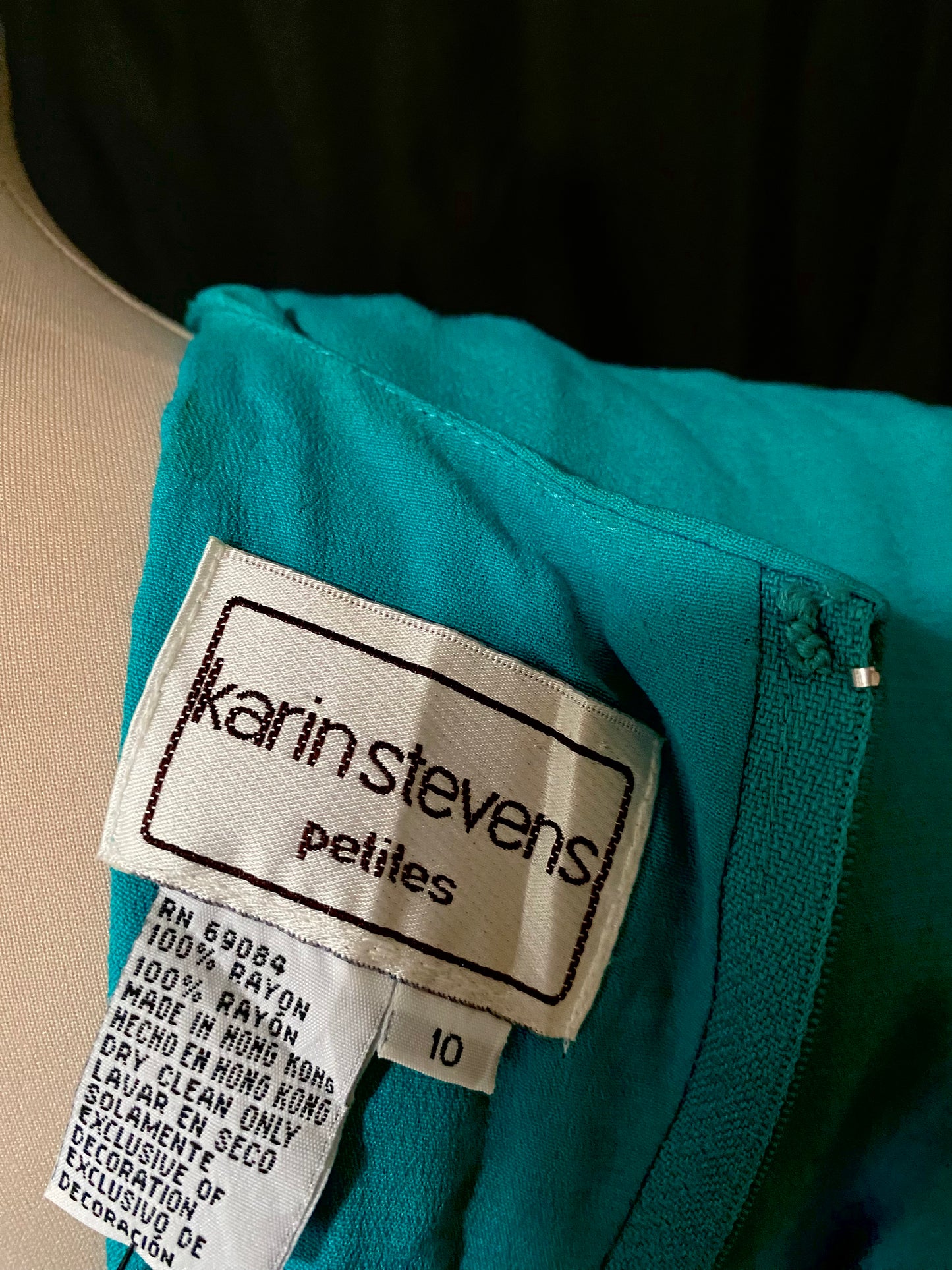 Green dress with embroidery and rhinestones from the 80s