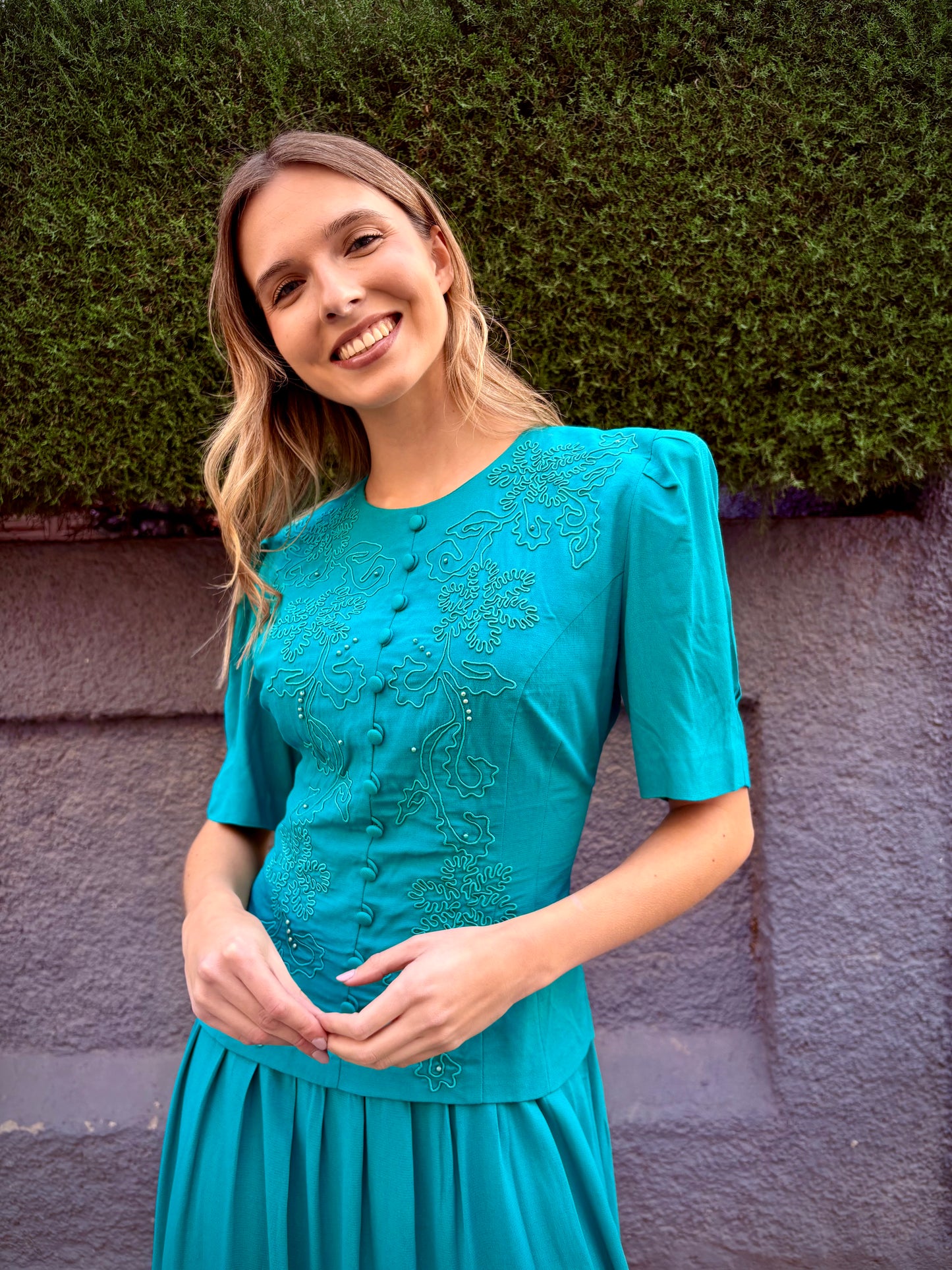 Green dress with embroidery and rhinestones from the 80s