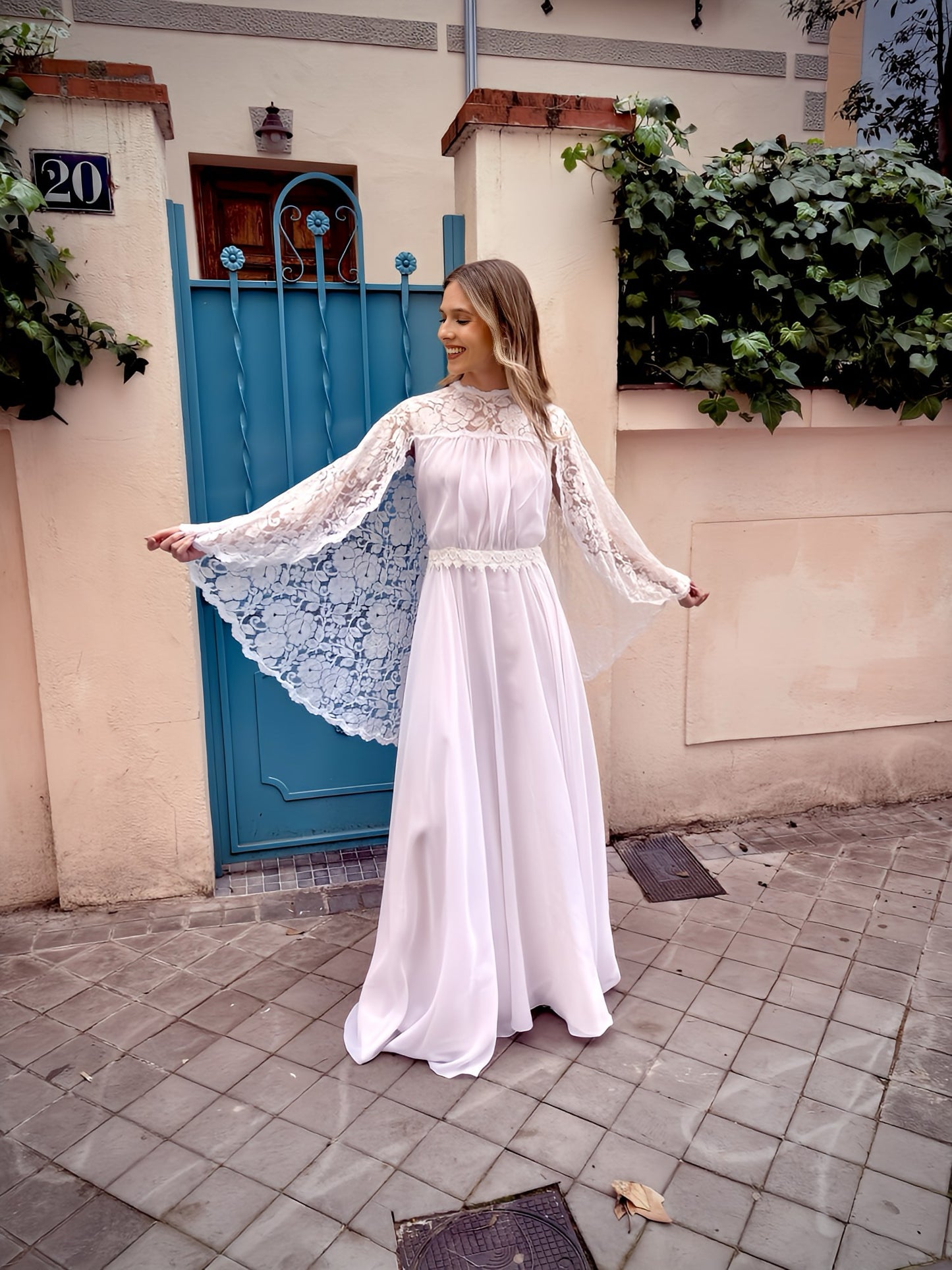 Vestido de novia vintage con capa de encaje