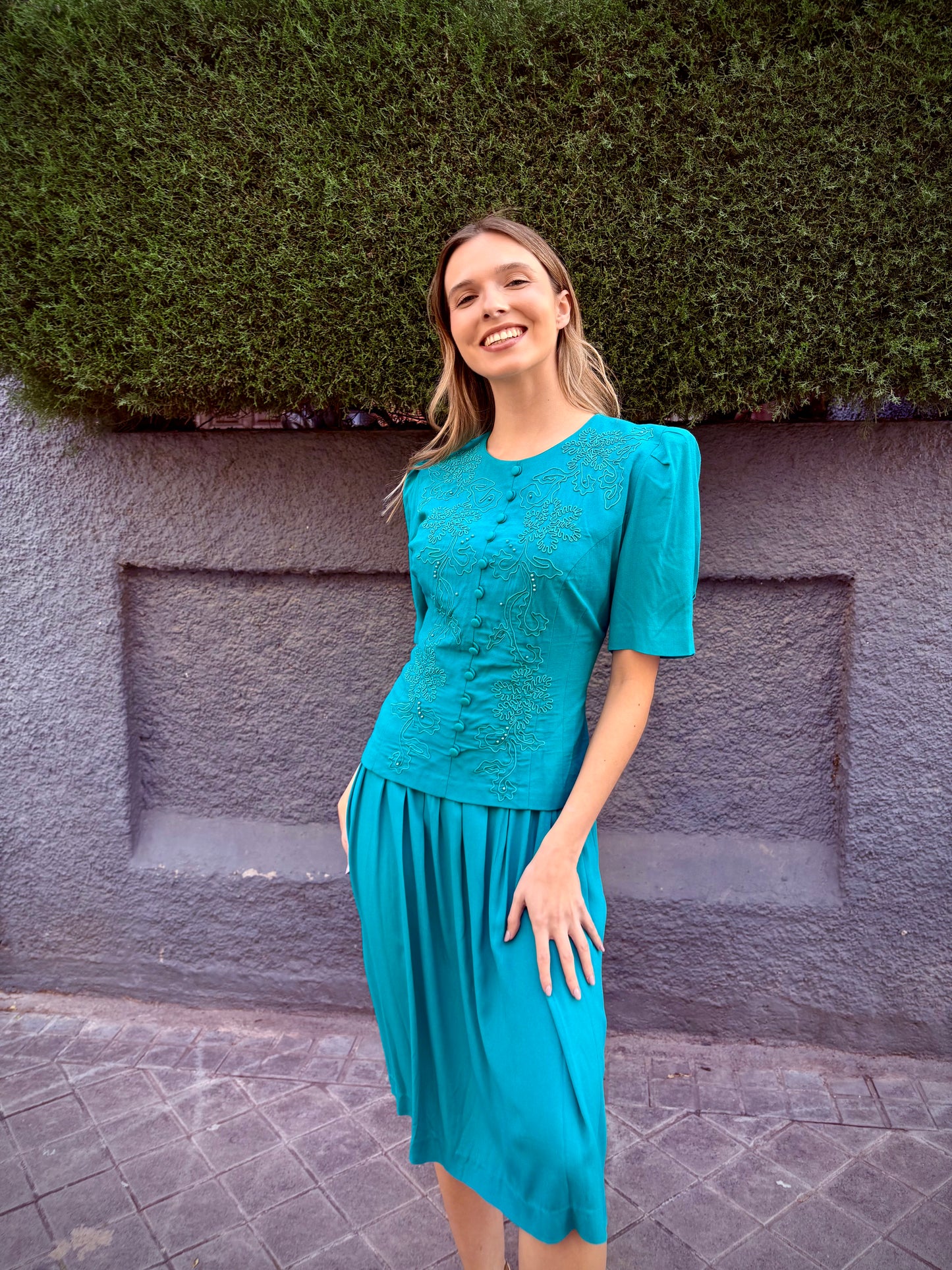 Green dress with embroidery and rhinestones from the 80s